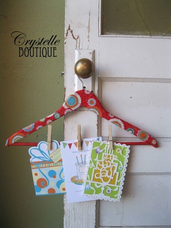 CrystelleBoutique - Fabric covered clothes hanger to display cards