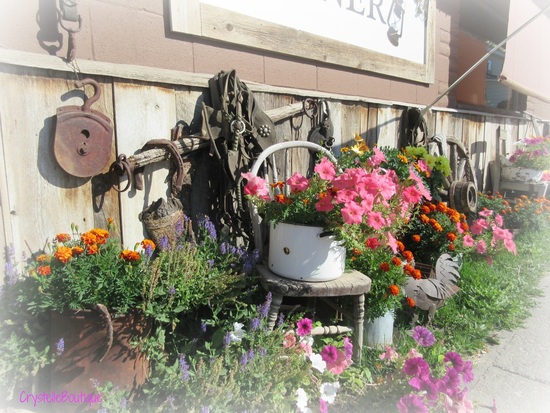 CrystelleBoutique - An old chair, an old wash basin, an old bucket, and old pot an old tub: they are all used as flower stands or pots.  