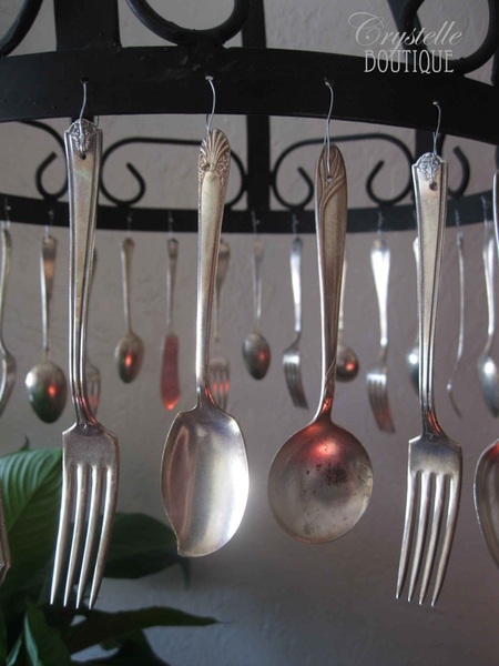 Vintage silverware ahnding from my pot-rack chandelier